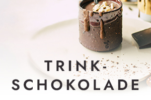 Trinkschokoladen von Heimbs Kaffee Becher mit Heißer Schokolade